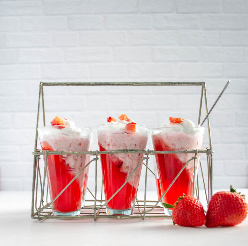 strawberry jello parfait in a wire caddy