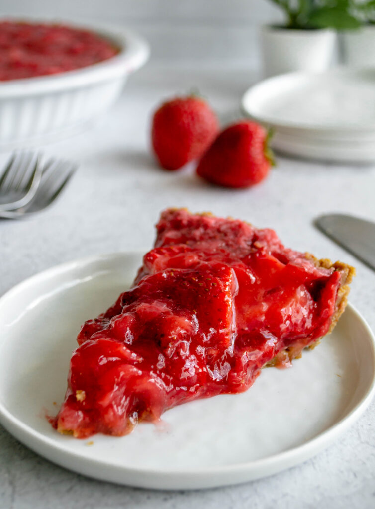 slice of strawberry pie on a white plate