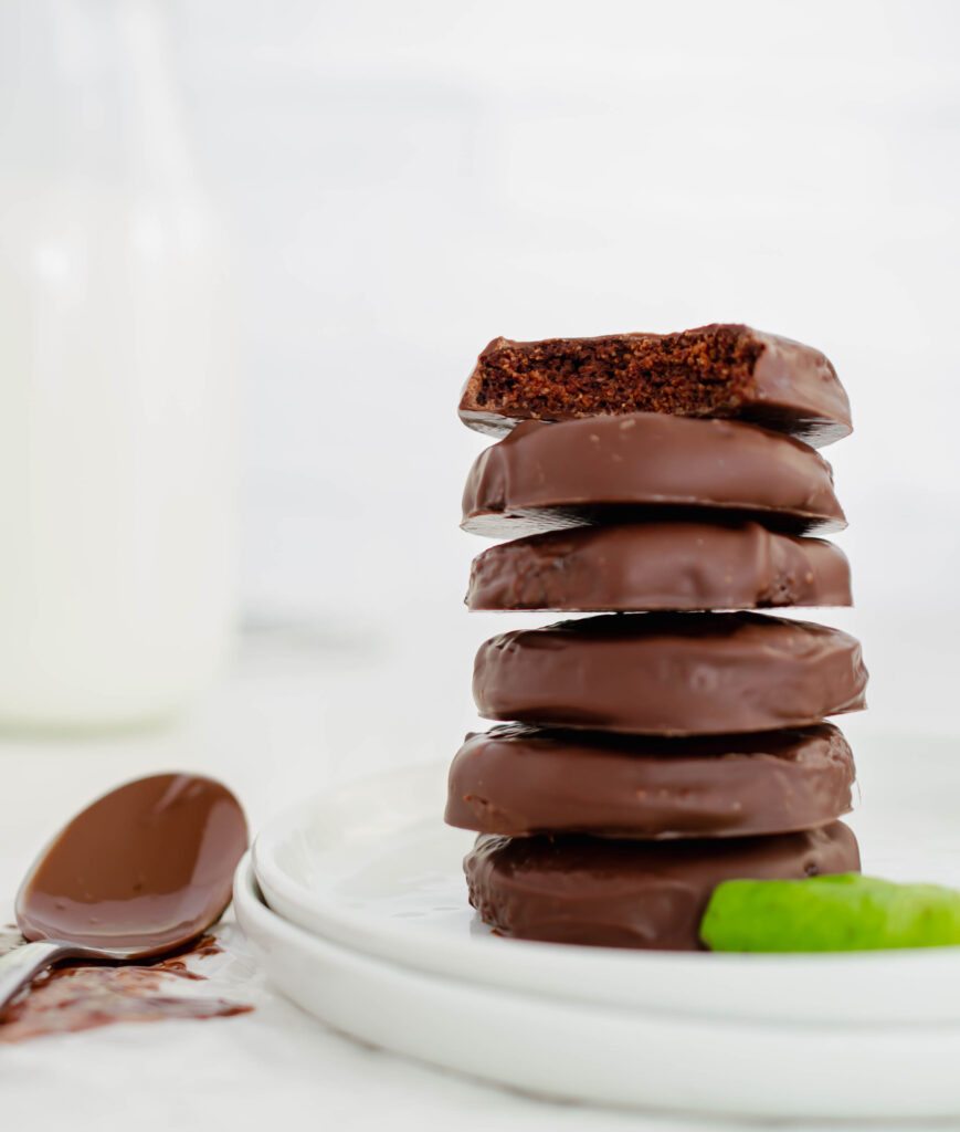 stack of keto thin mints with a bite taken out of the top cookie