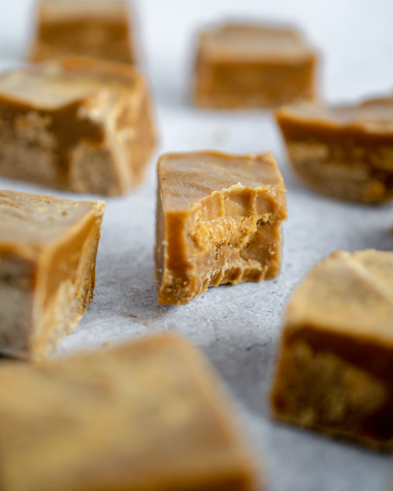 Keto Sugar Free Peanut Butter Fudge with a bite taken out of it