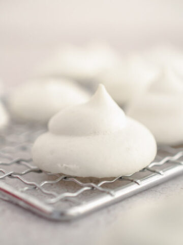 Keto Meringue Cookies on a cooling rack