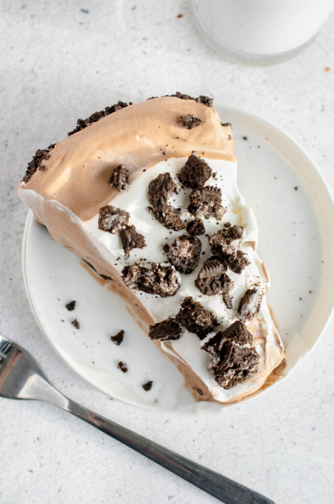 slice of dirt pie covered in crushed oreos
