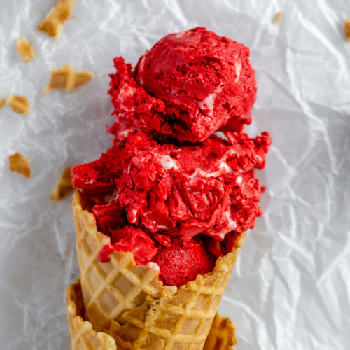red velvet ice cream in a waffle cone