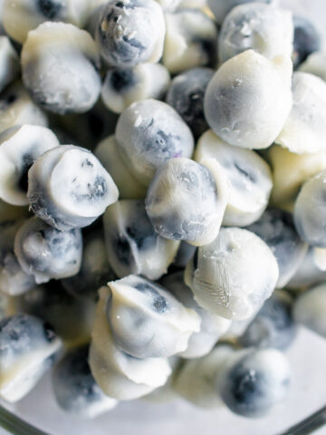 yogurt covered blueberries in a bowl