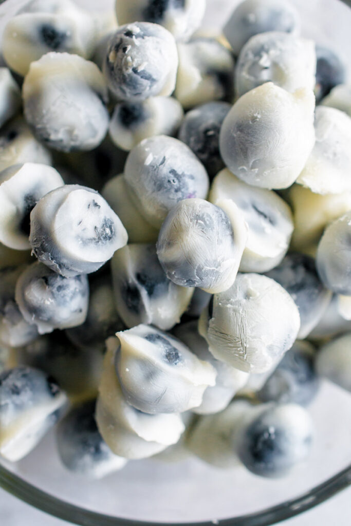 yogurt covered blueberries in a bowl