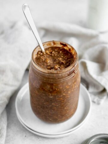 nutella overnight oats in a glass mason jar