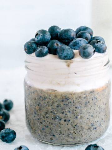 blueberry chia pudding topped with yogurt and blueberries