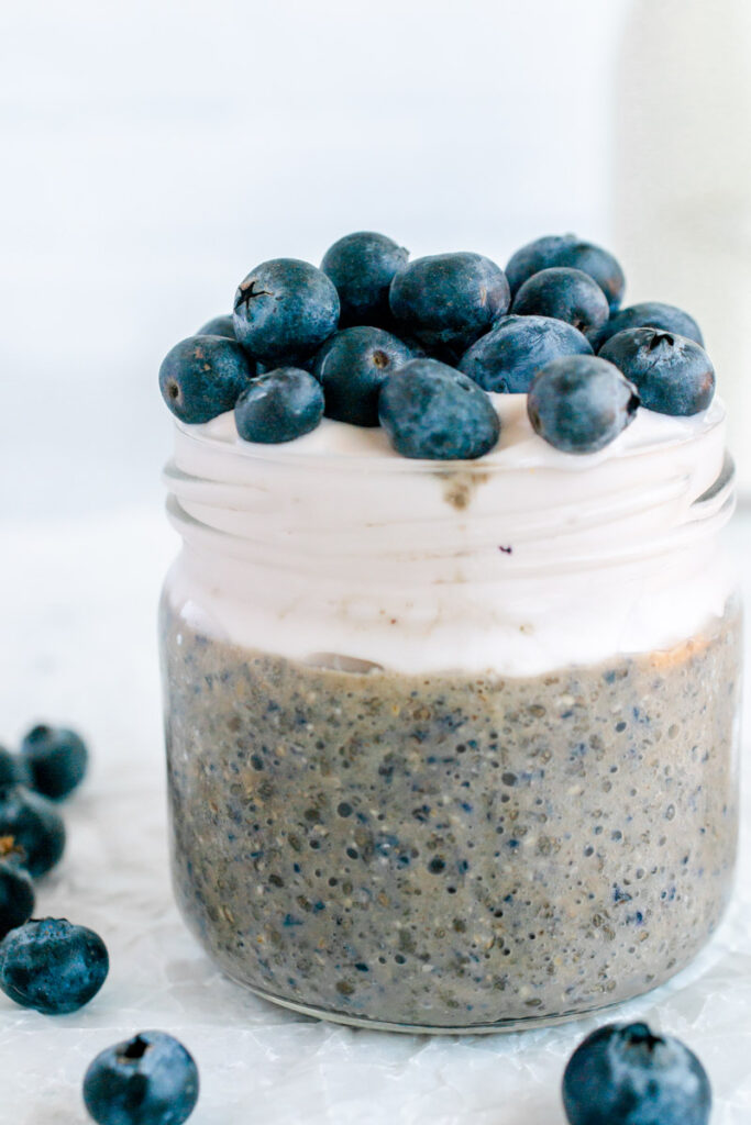blueberry chia pudding topped with yogurt and blueberries