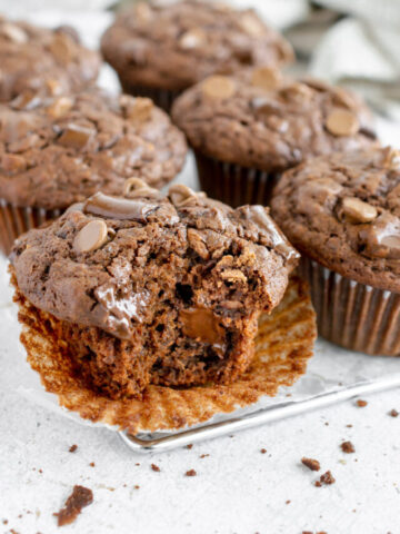 triple chocolate muffins on a cooling rack