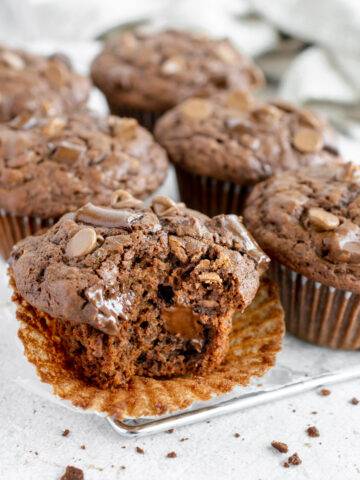 triple chocolate muffins on a cooling rack