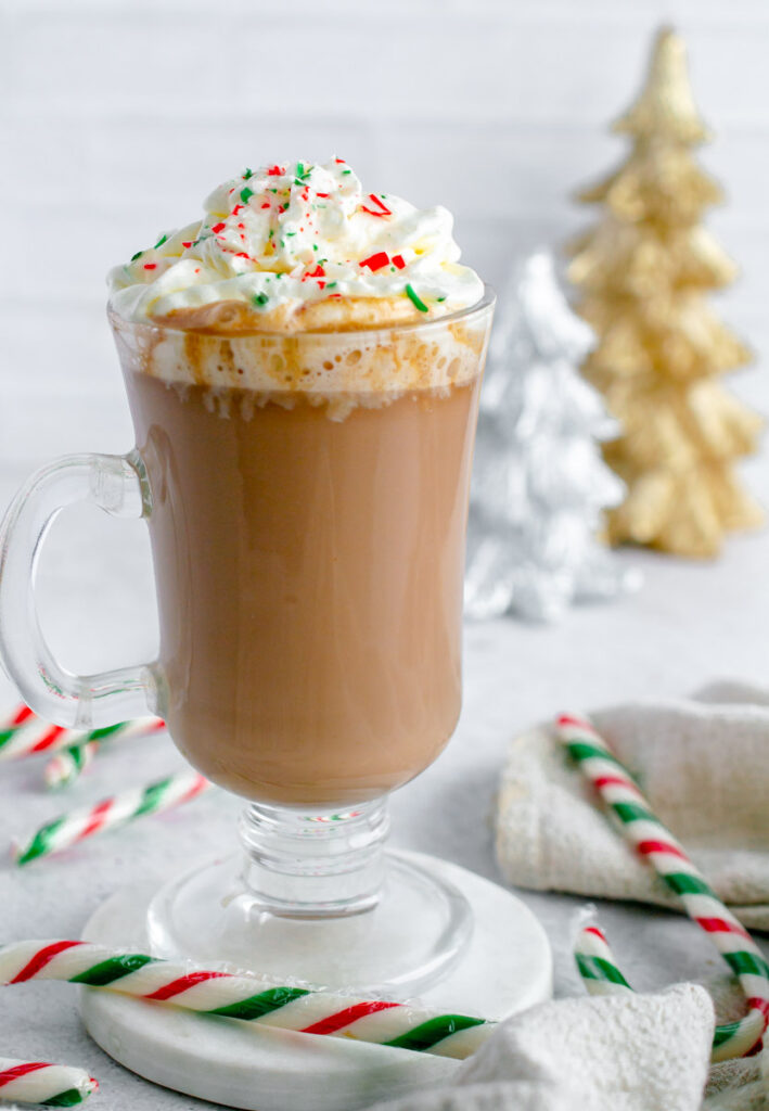 candy cane hot chocolate topped with whipped cream