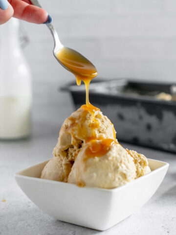 butterscotch ice cream in a white bowl