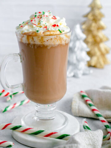 candy cane hot chocolate topped with whipped cream