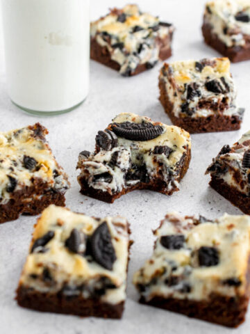 bite taken out of oreo cheesecake brownies