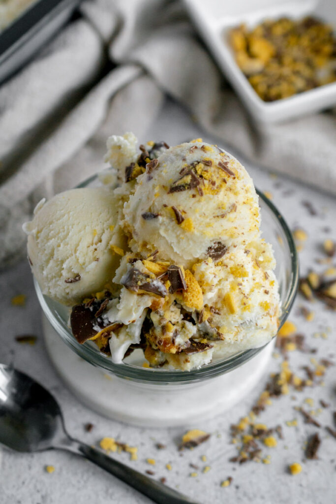 crunchie ice cream in a glass bowl