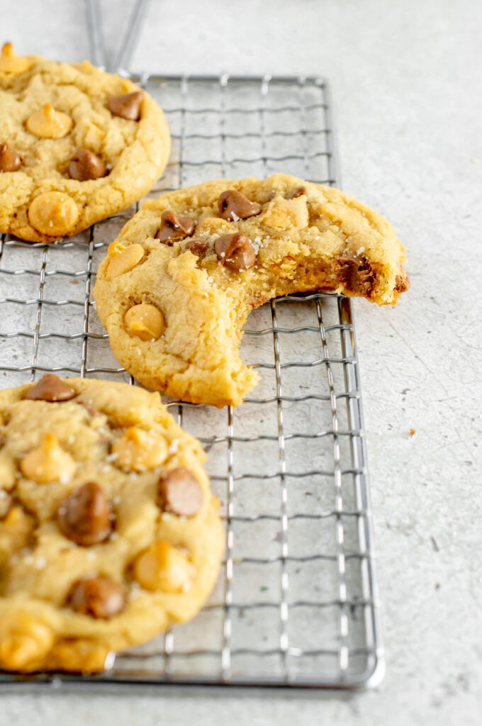 butterscotch chocolate chip cookies on a cooling rack
