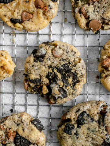 oreo and chocolate chip cookies on a cooling rack