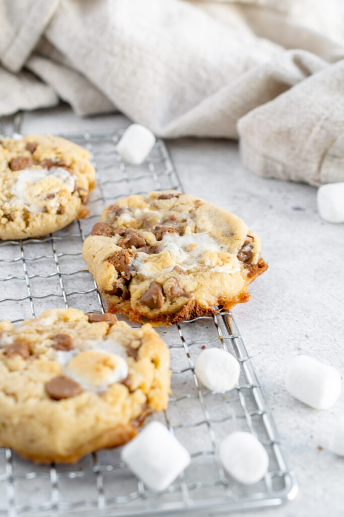 chocolate chip marshmallow cookies on a cooling rack