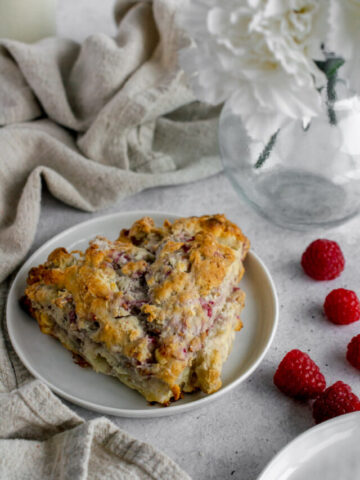white chocolate raspberry scones on a plate